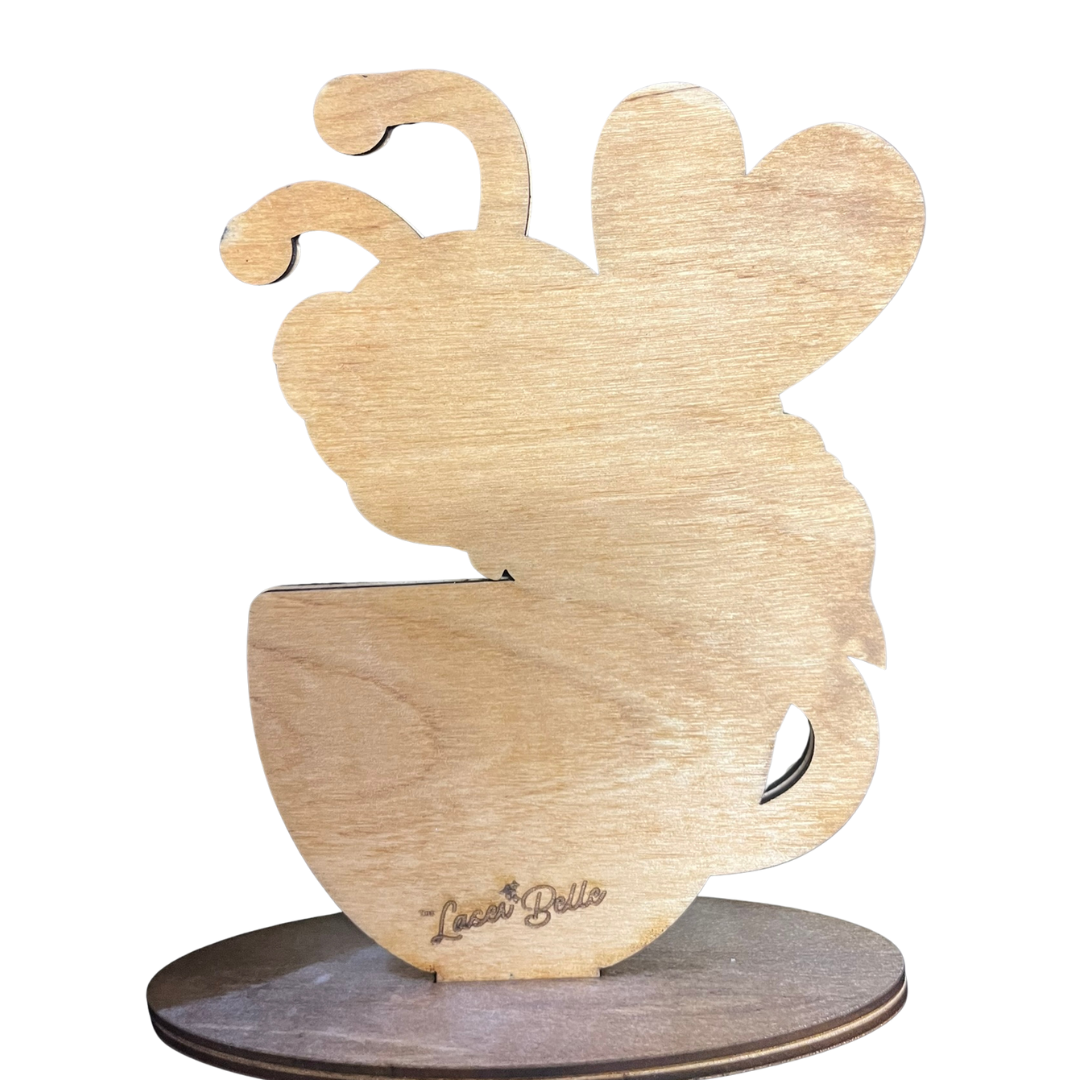 Wooden cat-shaped stand with a cup design on a white background